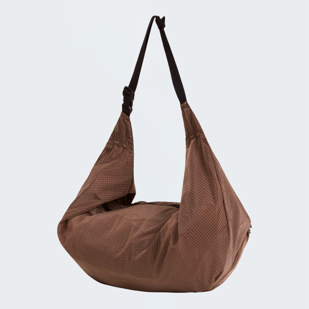 NEVER STOP UTILITY SLING BAG