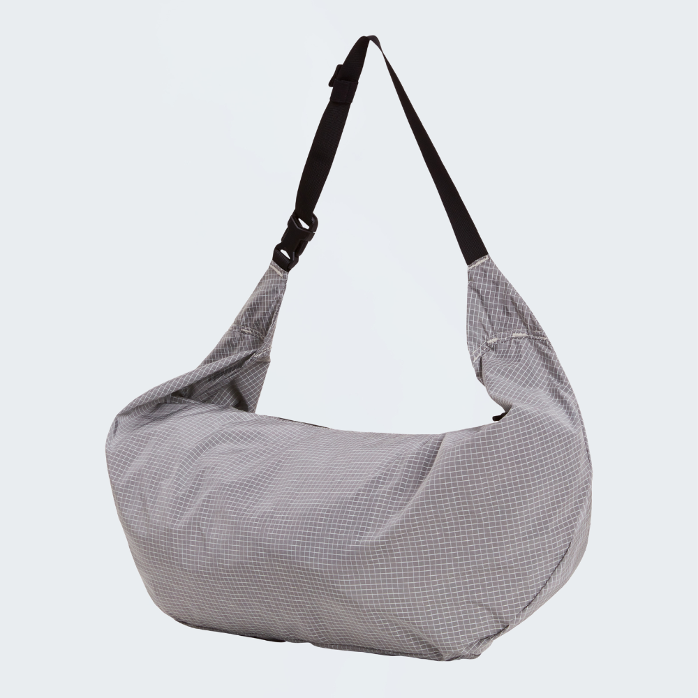NEVER STOP UTILITY SLING BAG